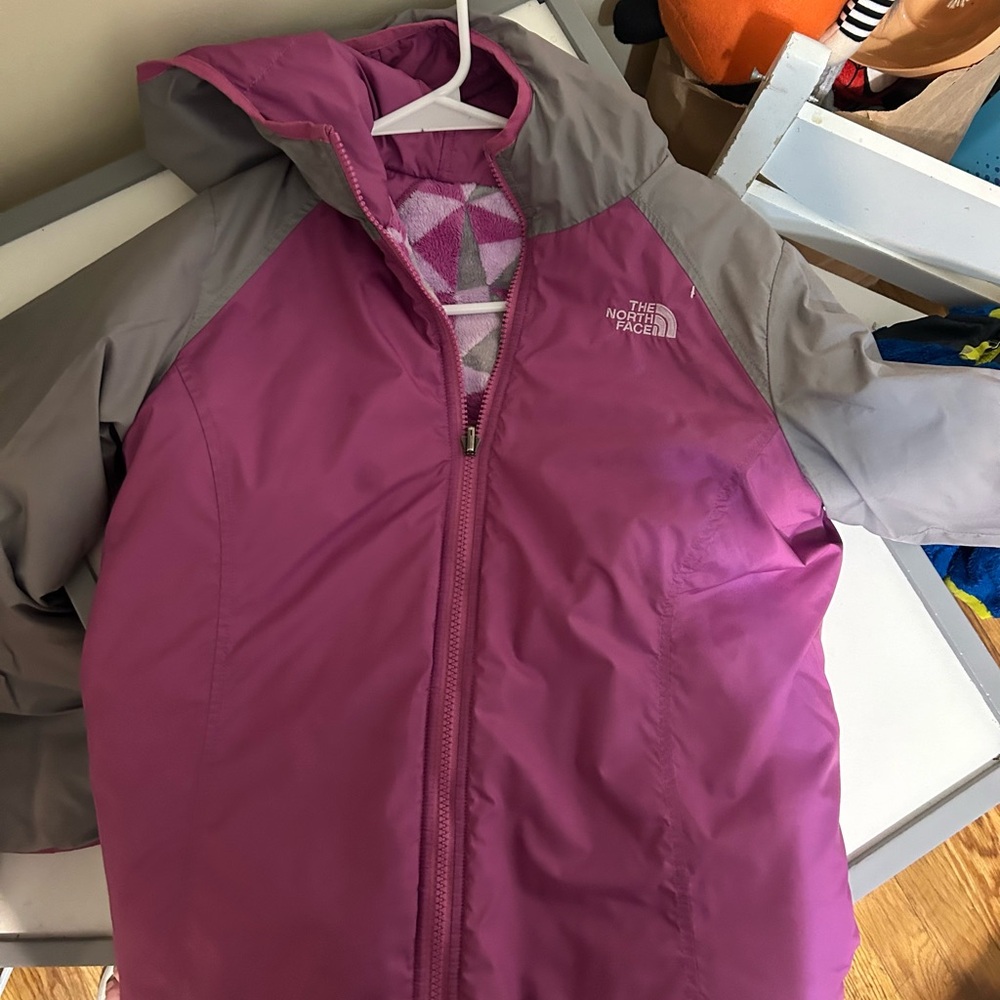North face girls size 14/16 purple reversible, rain resistant jacket.